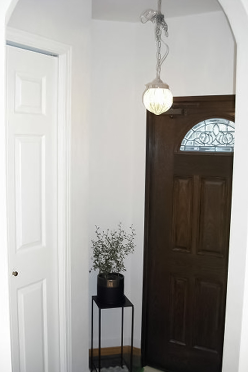 玄関：アーチや玄関収納を大きく取り、有効なスペースができた玄関。